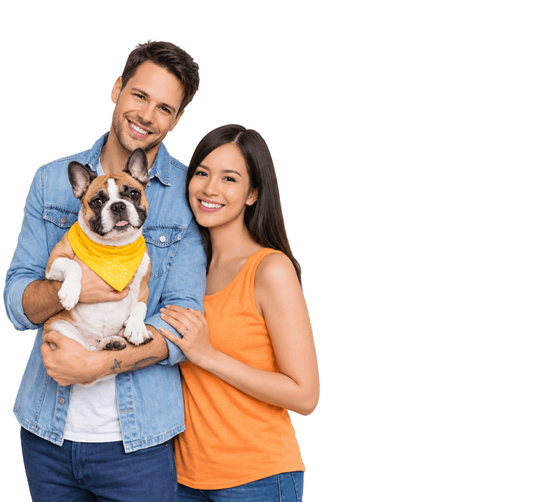 Pet owners smiling with their dog